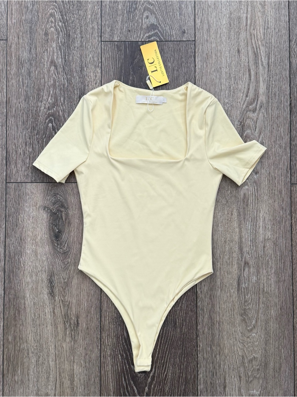 NWT Lizette Collection Butter Yellow Square Neck Bodysuit | Size Large